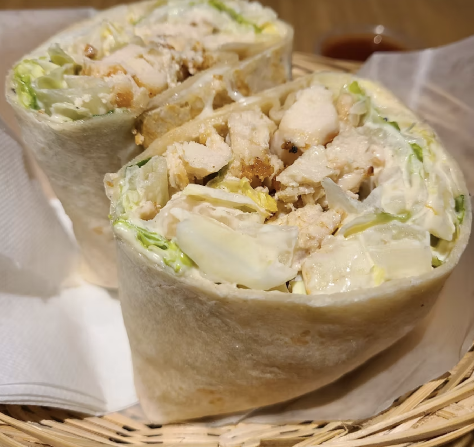 A hearty chicken Caesar wrap filled with tender chicken, crisp lettuce and creamy Caesar dressing.